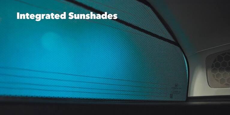 2027 Honda Odyssey Elite detail of the integrated sunshades on the rear passenger window (Minivan).